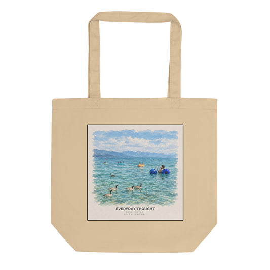 Oyster organic cotton canvas tote bag printed with an illustration of people rolling in the summer waves
